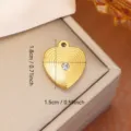 Gold heart-shaped stainless steel pendant with concentric ripples and rhinestone detail - Ripple Heart Style (0104)