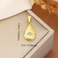 Golden stainless steel teardrop pendant with starburst detail for jewelry DIY, 1.6x1cm - Teardrop Starburst Style (0109) / Gold