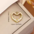 Close-up of gold stainless steel heart pendant with rhinestones for DIY jewelry making - Heart Rhinestone Border Style (0130) / Gold