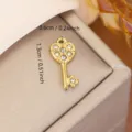 Small golden stainless steel heart-shaped key pendant for DIY jewelry making and crafts - Heart-Key Rhinestone Style (0141) / Gold