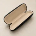 Black leather eyeglasses case with soft beige interior lining for daily protection and storage. - OY952 Glasses Case Without Rhinestones