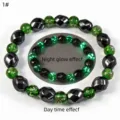Detailed view of luminous green glass beads bracelet showing day and night glow effects - 1# Green Style / Green