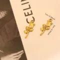 Detailed view of golden stainless steel rose charms with dimensions 2x1 cm. - Rose (036)