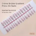 Detail view of 30pcs gradient press-on nails with pearls and heart rhinestones. - Brulée Milk Foam (T473)