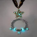 Detailed macro view of luminous glowing star pendant necklace and matching starfish bracelet - Necklace Bracelet Set / 118# Gold (Cyan Light)