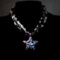 Macro view showing the glowing star pendant on a retro leopard print fabric necklace. - Necklace / White K (Rose Red Light)