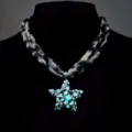 Close-up of leopard print necklace with glowing star pendant and pearl embellishments. - Necklace / White K (Cyan Light)