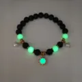Luminous summer beach necklace with glowing green beads and gold-plated sun charm. - Gold Green Light Bracelet