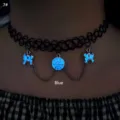 Detailed view of glowing blue spiderweb pendant on a black fishline choker necklace - Spider & Web Blue Glow (7#)