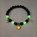 Glow-in-the-dark beaded bracelet with golden sun pendant for beach vacation - Gold Orange Red Light Bracelet