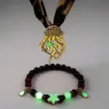 Detailed shot of luminous jellyfish pendant necklace with leopard ribbon and matching beaded bracelet - 19# Gold-Tone Orange-Red Necklace & Bracelet Set