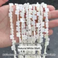 Natuurlijke witte schelpkraal bloemvorm voor doe-het-zelf sieraden maken 8x10mm 36st - Vlindervorm (Dwarsgat) / Natuurlijk Wit