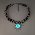 Luminous sun pendant necklace with leopard print fabric cord for a beach vacation - Silver Cyan Glow Necklace