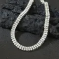 Detailansicht einer zweireihigen Strass-Tennis-Halskette mit glänzender silberner Oberfläche - Halskette / 40CM / Silber