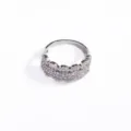 Close-up of elegant silver-colored ring with multi-row micro-pave cubic zirconia stones. - Size 6 / White Gold