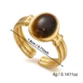 Detail view of a vintage gold tiger eye ring with 1.8cm diameter and 4g weight measurements - 1.8cm / Tiger's Eye Vertical Stripe