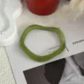 Matcha green bamboo style resin bangle with a minimalist wavy design for daily wear - Geometric Wave Shape Style / Ink Wash Green