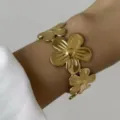 Bracciale rigido largo in acciaio inossidabile dorato con fiori per donna opaco - Stile Piccolo Fiore