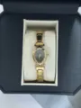 Elegant gold steel band watch with oval black dial and heart accents in a gift box - Watch Only (A856)