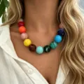 Detailed view of a vibrant bohemian multicolored oversized bead choker necklace on model - Retro Contrast Large Round Bead Style (A841-2) / Red Yellow Blue Patchwork (A841-2)