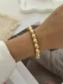 Elegante bracciale dorato in stile vintage con perle segmentate e finitura testurizzata - Stile Trama Perline Dorate (A829-2)