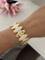 Luxuriöses gold-weißes Emaille-Armband im Meeresstil für den schicken Sommerurlaub - Oval / Weiß/Gold