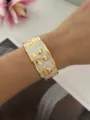 Elegante bracciale rigido largo smaltato dorato con motivo a ciliegia in bianco perlato - Bianco Ciliegia