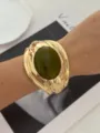Elegante bracciale rigido vintage dorato con grande pietra verde ovale al centro - Stile Intarsiato Ovale Verde (814-2)