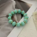 Unregelmäßiges jadegrünes Perlenarmband mit polierten Goldzwischenstücken für Damen - Unregelmäßiger Perlenstil (823) / 13 Stück (10mm) / Mintgrün