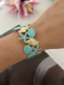 Exquisiter Emaille-Armreif im Meeres-Stil mit bunten Seesternen, Muscheln und Schildkröten - Schneckenhaus Seestern Stil / Seeblau/Gold