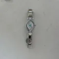 Silver stainless steel watch featuring unique evil eye shaped dial with blue indices - Silver Watch (A854)