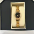 Elegant gold women's watch with octagonal black dial and steel band in luxury box - Octagon Black Dial Watch / Gold
