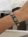 Exquisite colorful enamel geometric bangle bracelet featuring green stones in gold finish - Vintage Rhinestone Style / Dark Blue