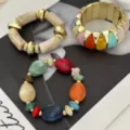 Elegante set di braccialetti in pietra macaron con polsino oro e perline vivaci - Set Marmo