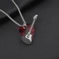 Detailed shot of rock-style stainless steel necklace with guitar pick and guitar pendants - Guitar With Red Pick / 60cm Stainless Steel Popcorn Chains / Black