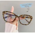 Detail view of chic tortoise shell cat eye blue light blocking glasses for women - Leopard Print