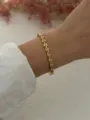 Elegant gold-finished infinity wavy link bracelet with clear zircon stones for daily wear - Evil Eye Wave Style (A720-2)
