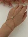 Gold finger bracelet with a delicate zircon flower, perfect for elegant daily wear accessories. - Flower Ring-Linked Bracelet (A720-3)