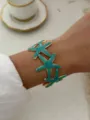Vergoldeter Emaille-Seestern-Armreif in leuchtendem Türkis für Damen, modisches Design - See-Blau Seestern Offener Armreif
