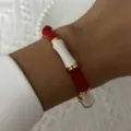 Vintage Chinese style enamel bamboo joint bangle featuring red and white sections on wrist - 6CM Diameter / Red and White Bamboo Style (BR26Y0274-2)