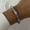 Vintage blue enamel bangle featuring pink floral patterns and gold scrollwork. - Vintage Blue Pink Floral Gold Pattern Style (14)