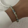 Vintage gold enamel bangle bracelet with floral pattern and crystal accents on wrist - 6CM Diameter / Blue Green Rhinestone Floral Style (BR26Y0274-5)