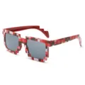 Close-up of red pixel pattern mosaic sunglasses with jagged 2D frame design - Red Checkered Frame