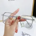 Modern grey transparent square frame anti-blue light glasses with minimalist design - Photochromic Lenses / Transparent Grey