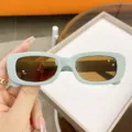 Élégantes lunettes de soleil pour enfants à monture ovale vert clair et verres bruns - Cadre Bleu Verres Thé