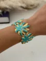 Elegant gold and teal enamel flower bangle for women in vintage stainless steel style - Blue Gold Sunflower Style
