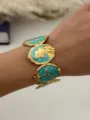 Vintage gold-plated mermaid medallion link bracelet with turquoise enamel artistic inlay - Blue Gold Floral Medallion Style