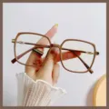 Montatura occhiali quadrata marrone anti-luce blu per donna con finitura opaca trendy - Stile Tè al Caffè (TR30087)