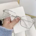 Stylish transparent silver square glasses frame with a retro anti-blue light lens design - Clear Anti-Blue Light Lens / Transparent Silver Frame