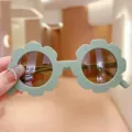 Cute sunflower shaped children's sunglasses in mint green with UV protective brown lenses - Green